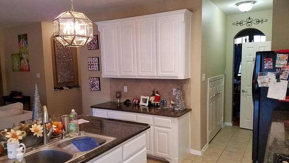 The same cabinets and desk painted white, after